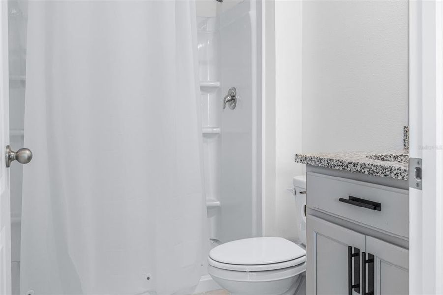 Furnished interior view inside a new home in Eagle Hammock, Eagle Lake (Image 14).
