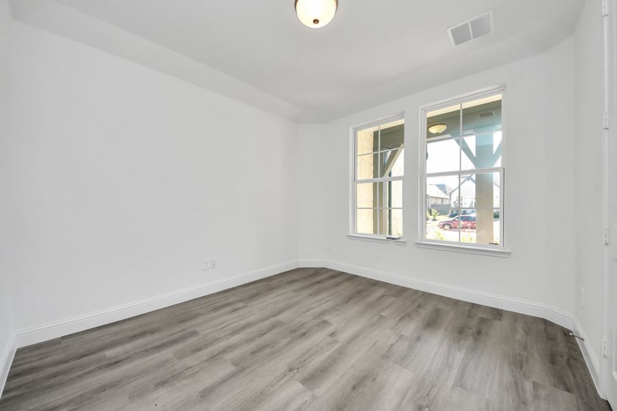 Spacious, unfurnished interior of a new home in ARTAVIA, Conroe (Image 23).