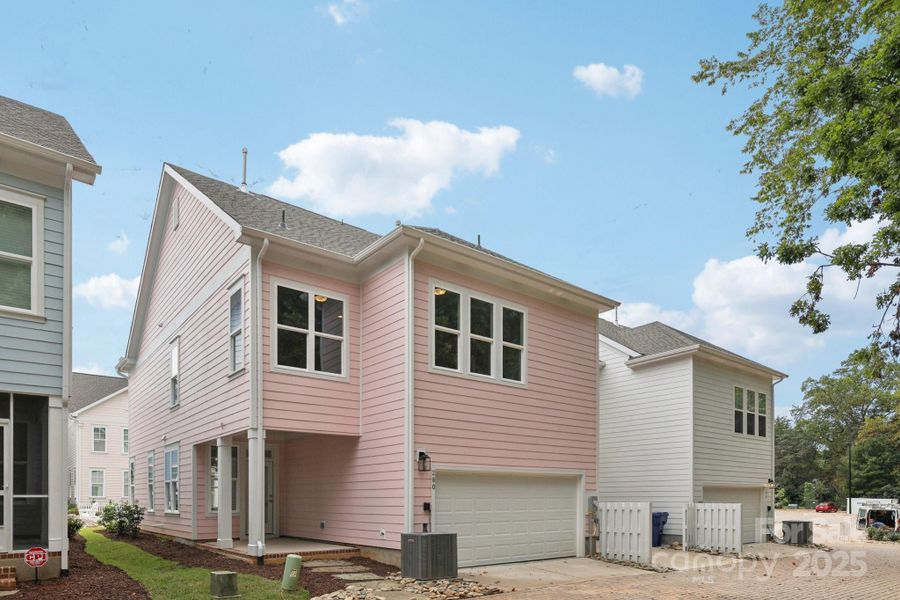 Exterior details and patio area of a home in Walk23, Huntersville (Image 18).
