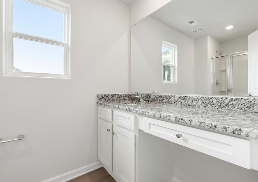 Master bath with a large vanity.