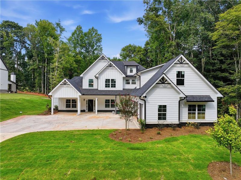 Front exterior of a new home in , Commerce, GA, highlighting curb appeal (Image 1). Front exterior of a new home in , Commerce, GA, highlighting curb appeal (Image 1).