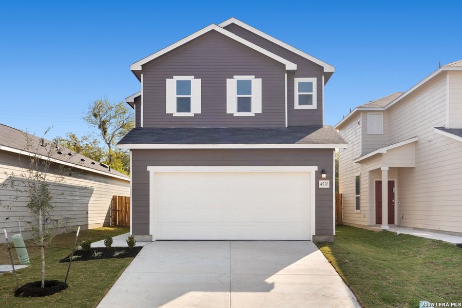 Front exterior of a new home in Spanish Trails Villas, San Antonio, TX, highlighting curb appeal (Image 20).