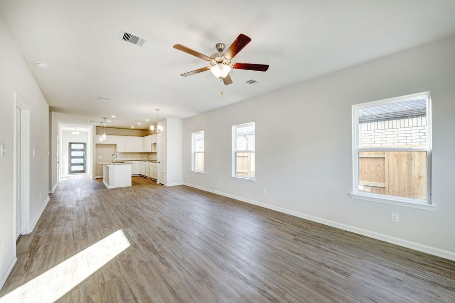 Family Room into Kitchen. Sample image for illustration; upgrades, options, and colors may vary. Family Room into Kitchen. Sample image for illustration; upgrades, options, and colors may vary.