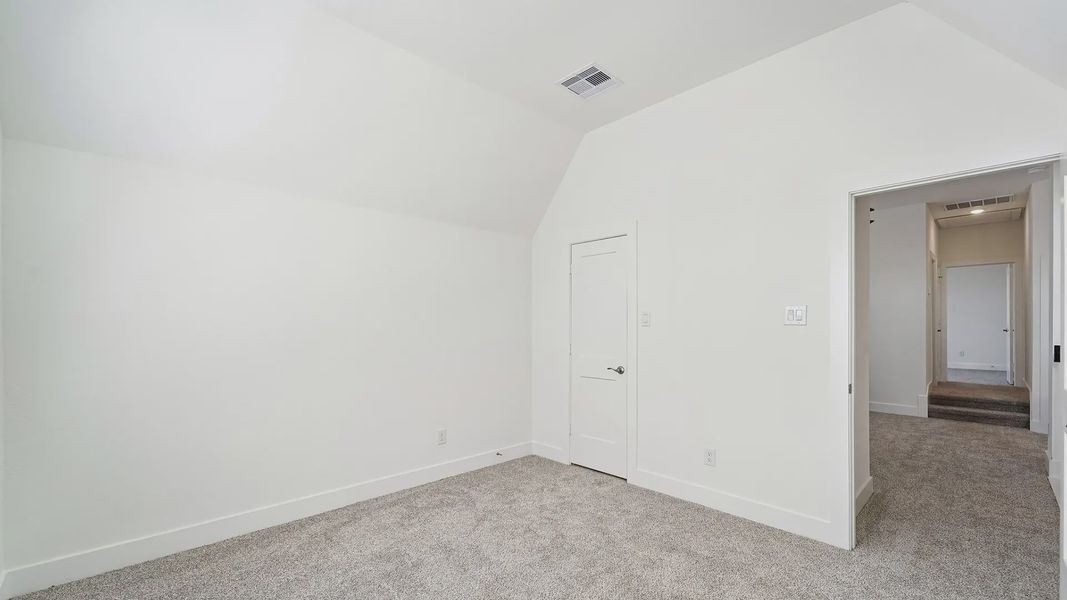 Representative unfurnished interior of a home built from the Cayman by Chesmar Homes in Crescent Bluff, Georgetown (Image 42).