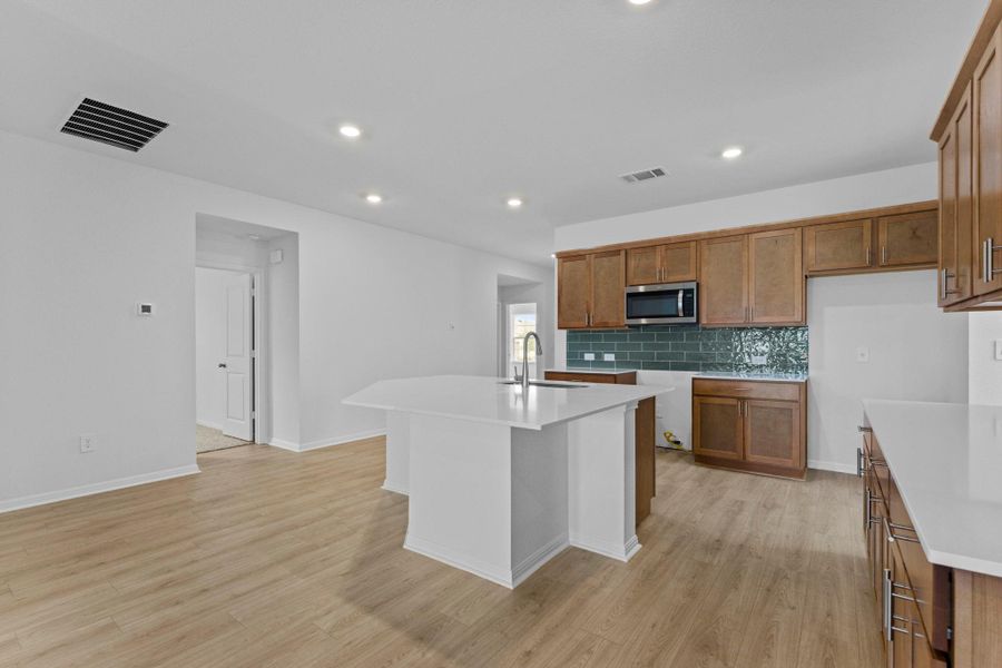 Furnished interior view inside a new home in Bar W Ranch, Leander (Image 10).