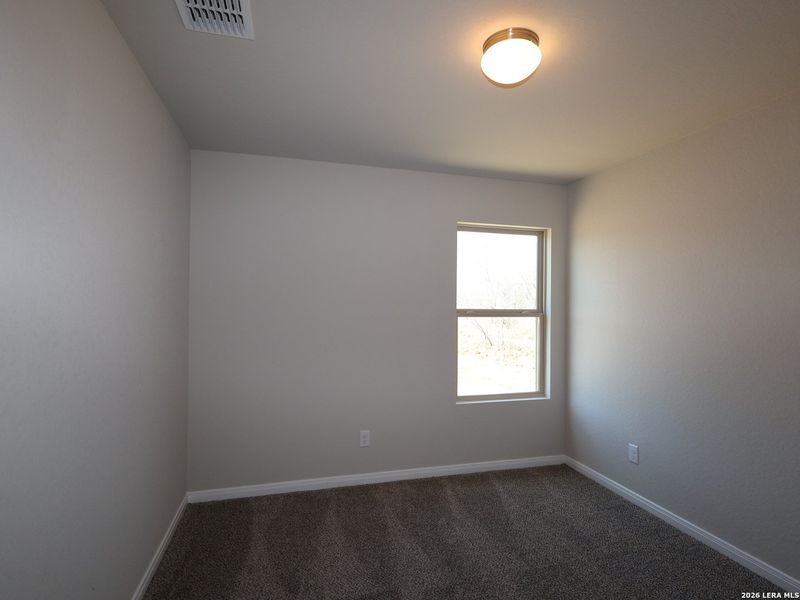 Spacious, unfurnished interior of a new home in Chaparral Ranch, Floresville (Image 29).