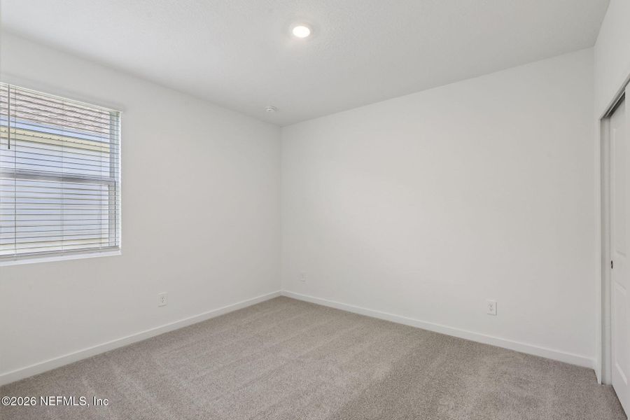 Spacious, unfurnished interior of a new home in Cypress Meadows - Signature Series, Jacksonville (Image 30).