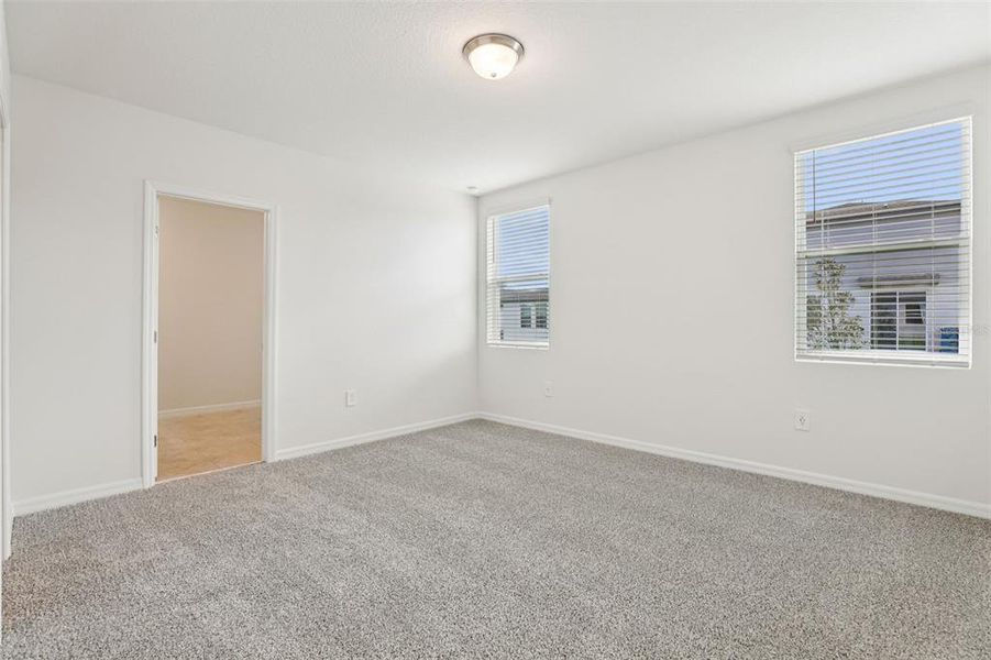 Spacious, unfurnished interior of a new home in Lawson Dunes - Signature Series, Haines City (Image 32).