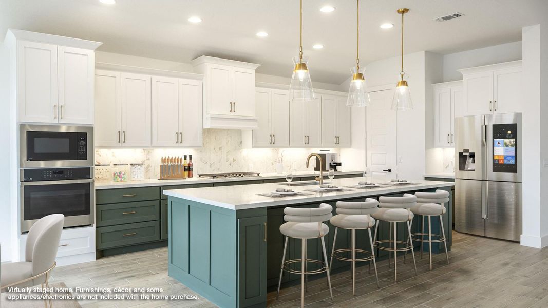 Kitchen featuring stainless steel appliances, decorative backsplash, white cabinets, wood tiled floors, and recessed lighting Kitchen featuring stainless steel appliances, decorative backsplash, white cabinets, wood tiled floors, and recessed lighting