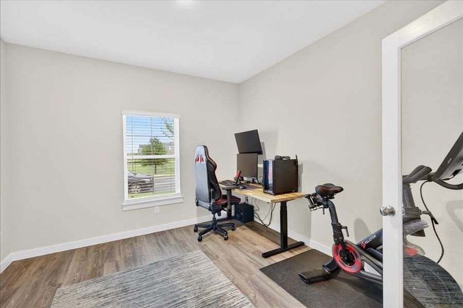 Office with luxury vinyl flooring and glass doors Office with luxury vinyl flooring and glass doors