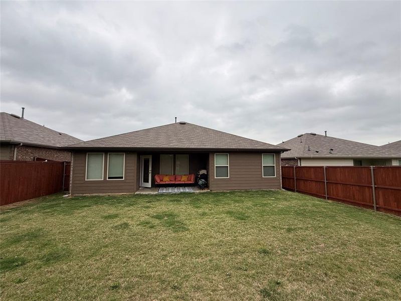 Exterior details and patio area of a home in Three Oaks, Sherman (Image 4).