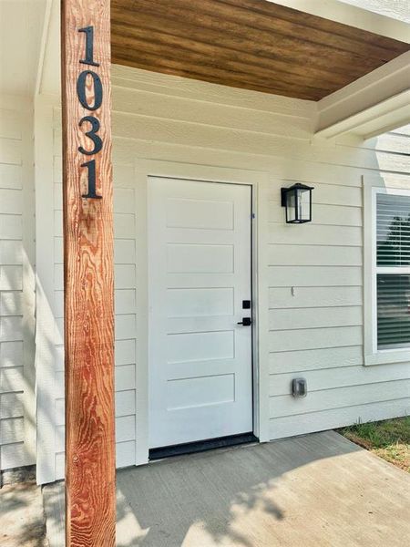 Exterior details and patio area of a home in , Denison (Image 4).