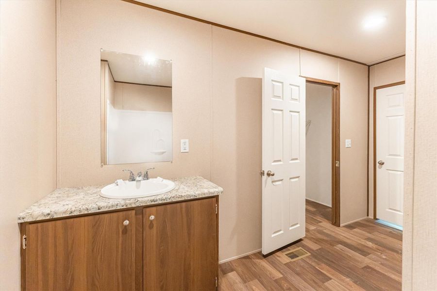 Furnished interior view inside a new home in , Conroe (Image 7).