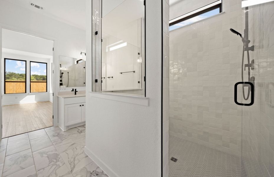 Representative furnished interior of a home built from the Dobbin by Pulte Homes in 6 Creeks, Kyle (Image 11).