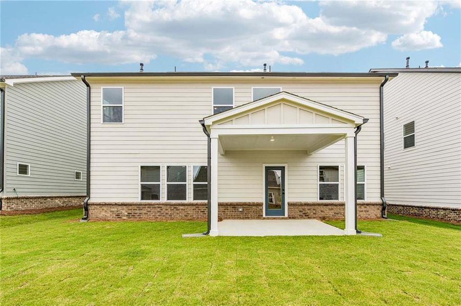 Exterior details and patio area of a home in Eastlyn Crossing, Flowery Branch (Image 4).