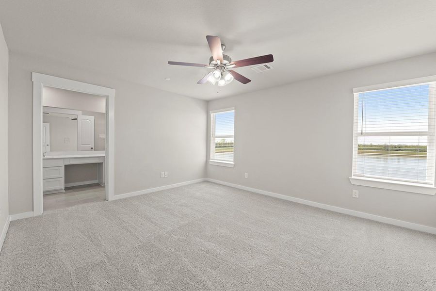 Primary Bedroom overlooks your water view of the pond.