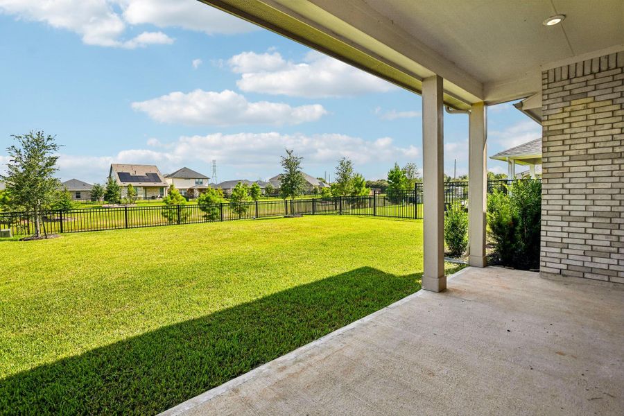 Exterior details and patio area of a home in Sunterra, Katy (Image 3). Exterior details and patio area of a home in Sunterra, Katy (Image 3).