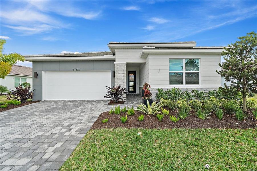 Front exterior of a new home in , Venice, FL, highlighting curb appeal (Image 2).