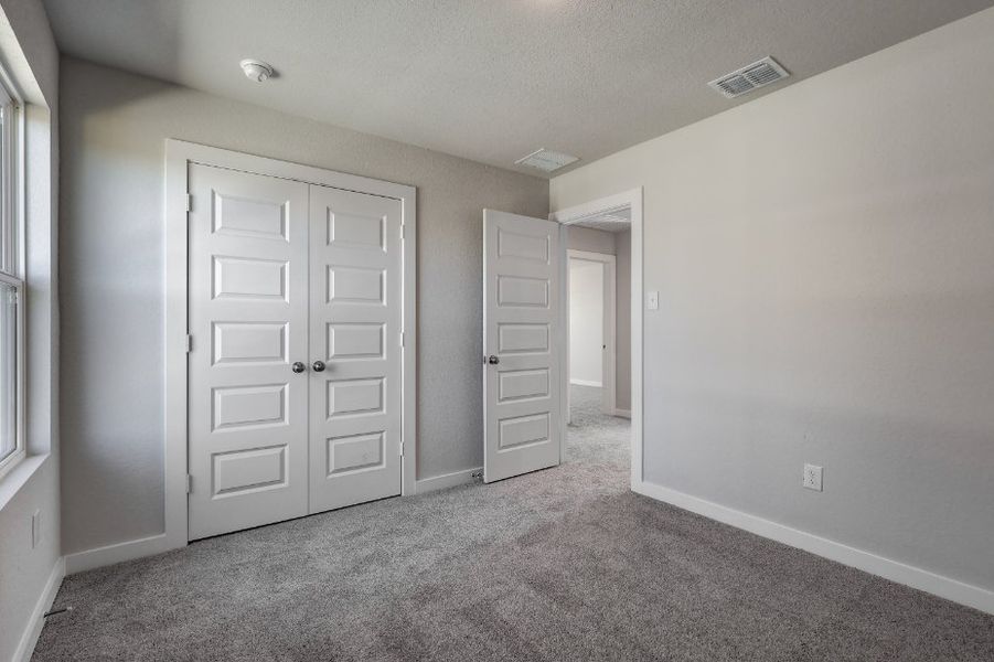A room with white doors.