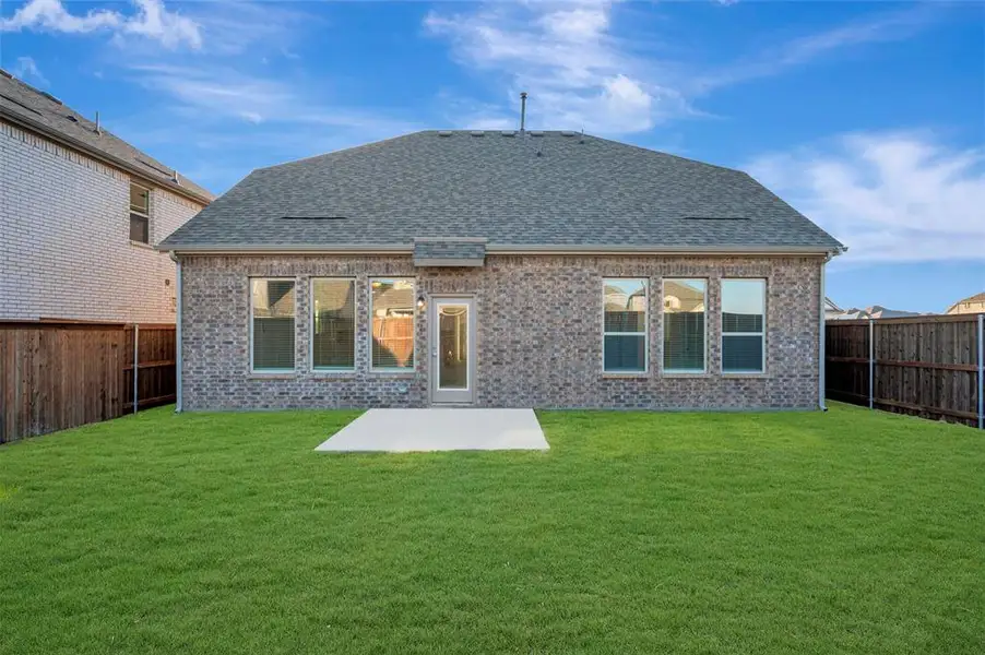Exterior details and patio area of a home in Lily Creek at Sutton Fields, Aubrey (Image 3).