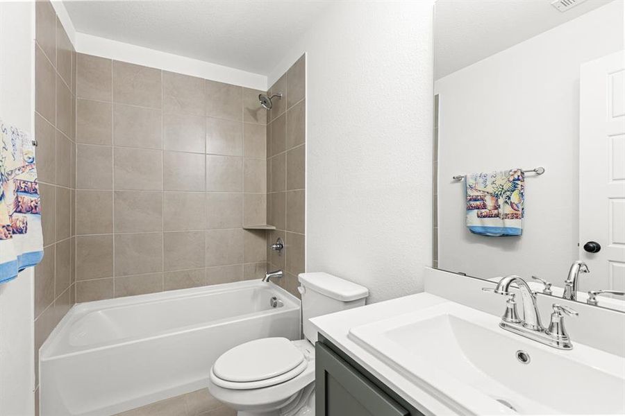 Furnished interior view inside a new home in Waterscape 50s Sales Phase 2, Royse City (Image 11).