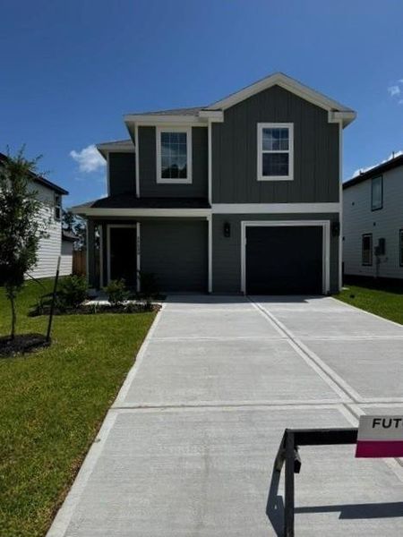 Front exterior of a new home in Townsend Reserve, Splendora, TX, highlighting curb appeal (Image 1). Front exterior of a new home in Townsend Reserve, Splendora, TX, highlighting curb appeal (Image 1).