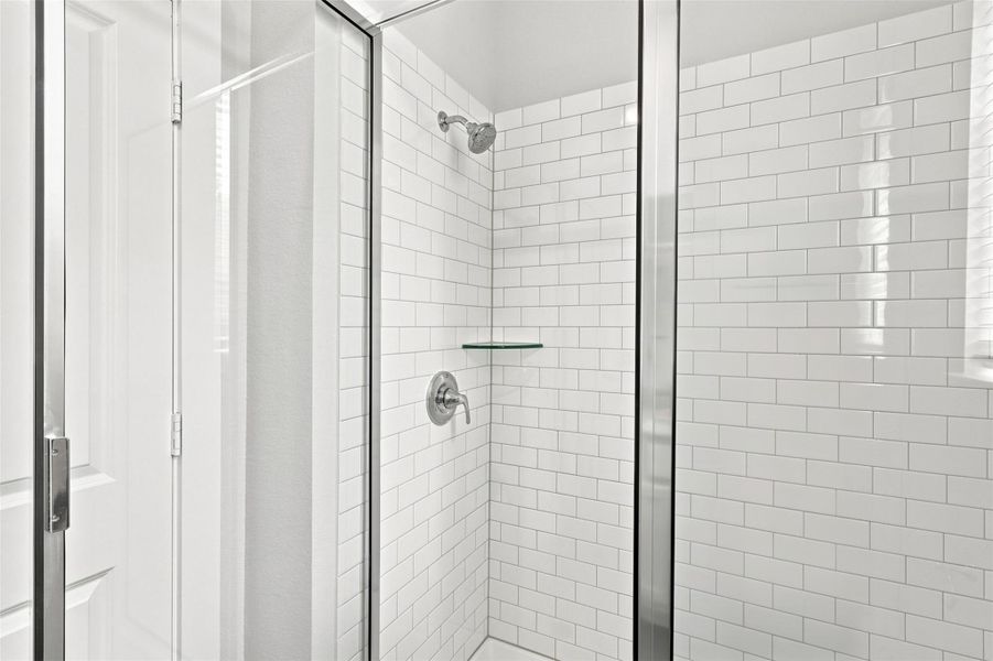 Full bathroom with oversized shower just outside of first floor en-suite. Glass shower enclosure