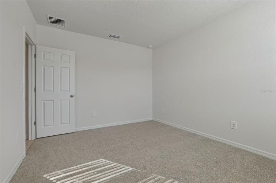 Spacious, unfurnished interior of a new home in The Reserve at Twin Lakes, St. Cloud (Image 22).