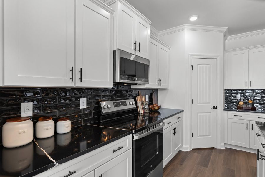 Representative furnished interior of a home built from the The Redbud by Chesapeake Homes in Coastal Club of the Carolinas, Calabash (Image 40).