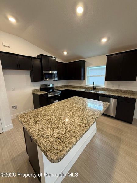 Furnished interior view inside a new home in Winding Oaks, Weeki Wachee (Image 5).