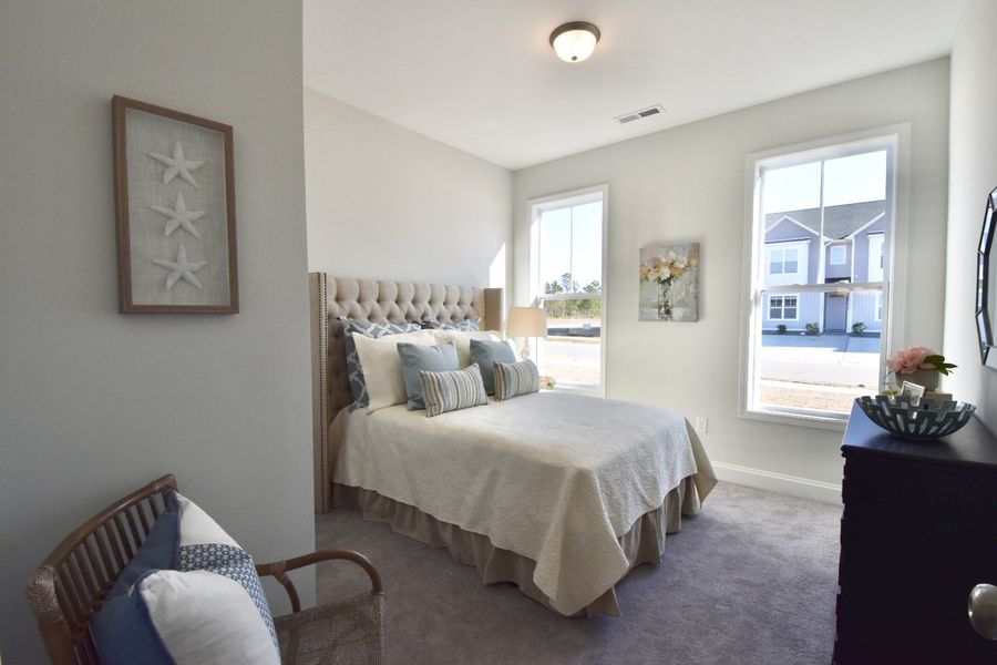Representative furnished interior of a home built from the Isla by Stevens Fine Homes in Parkwood Estates, Leland (Image 14).