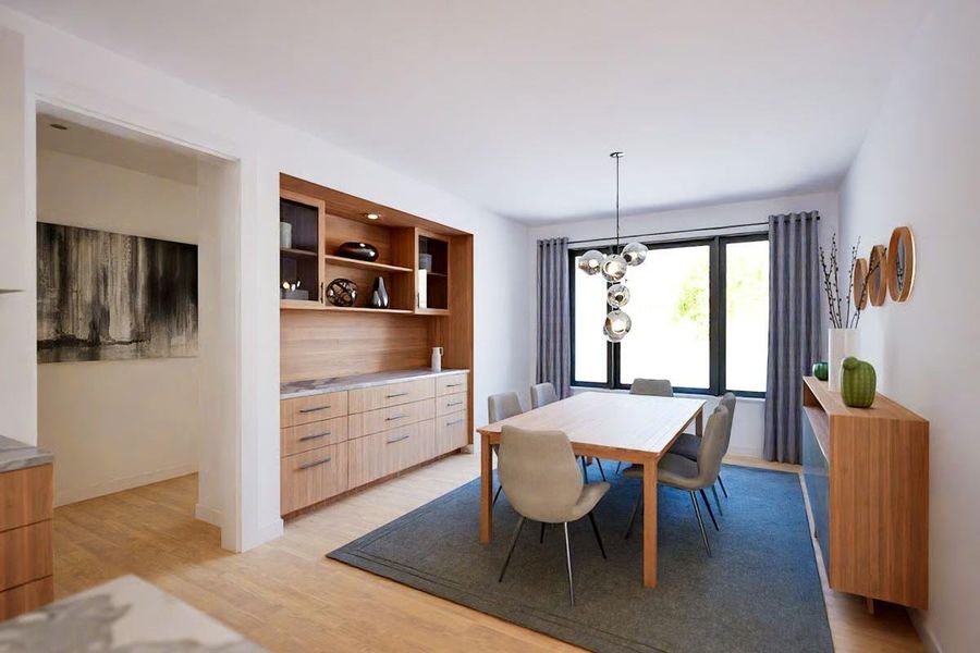 Dining space with stunning built-in hutch and quartz countertop offers functional storage and a beautiful design. Dining space with stunning built-in hutch and quartz countertop offers functional storage and a beautiful design.