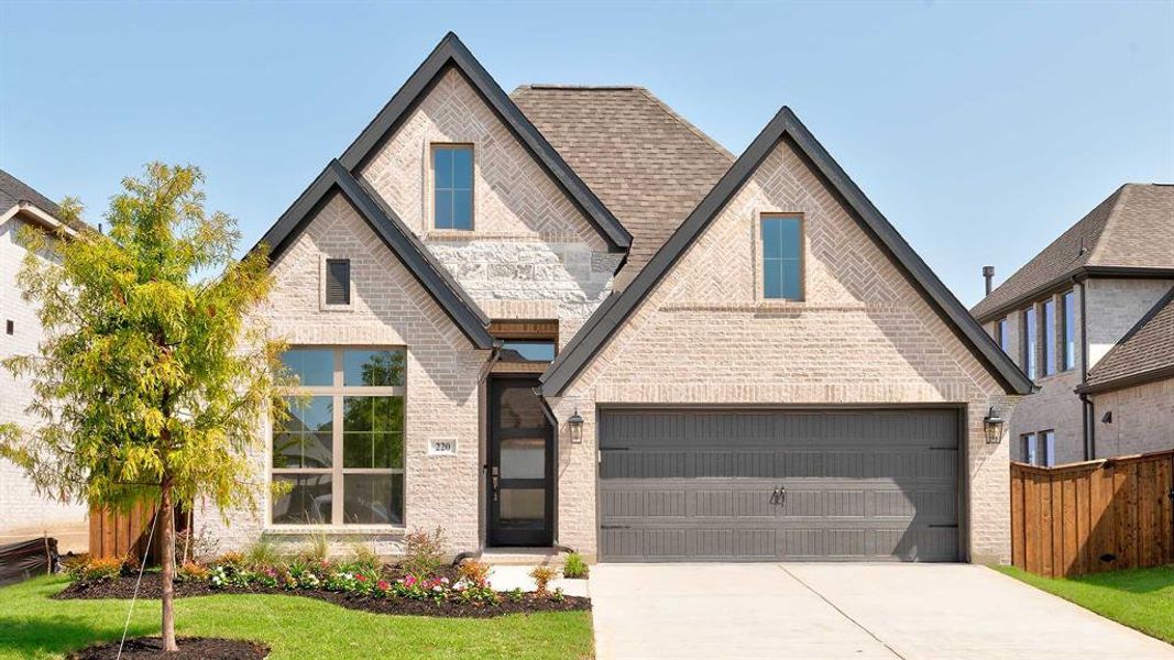 Front exterior of a new home in Trinity Falls 45', McKinney, TX, highlighting curb appeal (Image 1).