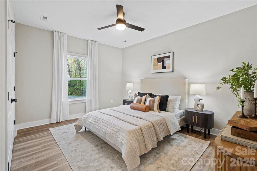 Photo of nearly identical home so you can see the space with furniture.