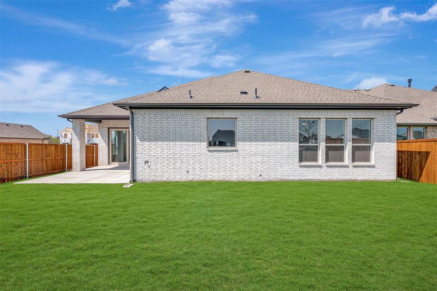 Exterior details and patio area of a home in Wellington, Haslet (Image 3).