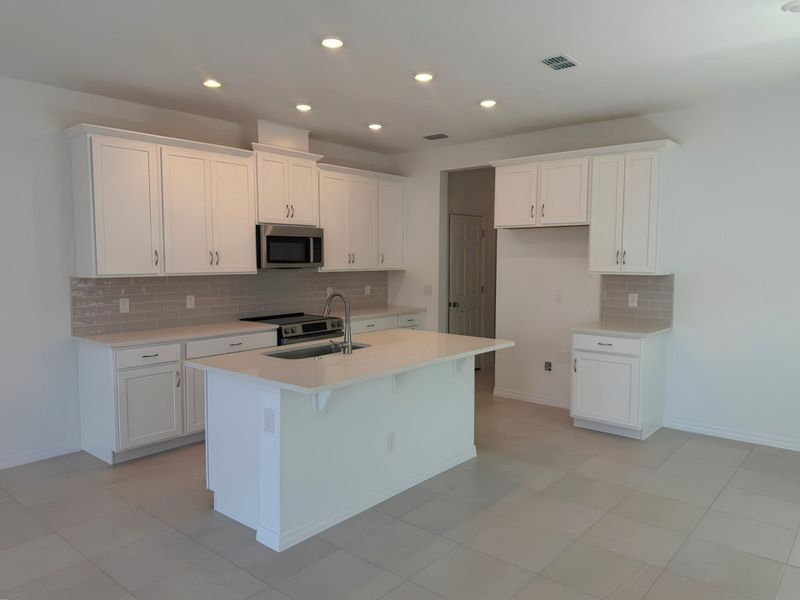 Furnished interior view inside a new home in Cypress Bluff, Groveland (Image 3).