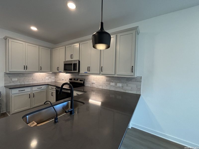 Furnished interior view inside a new home in The Summit at Saddlebrook Ranch 55's, Schertz (Image 6).