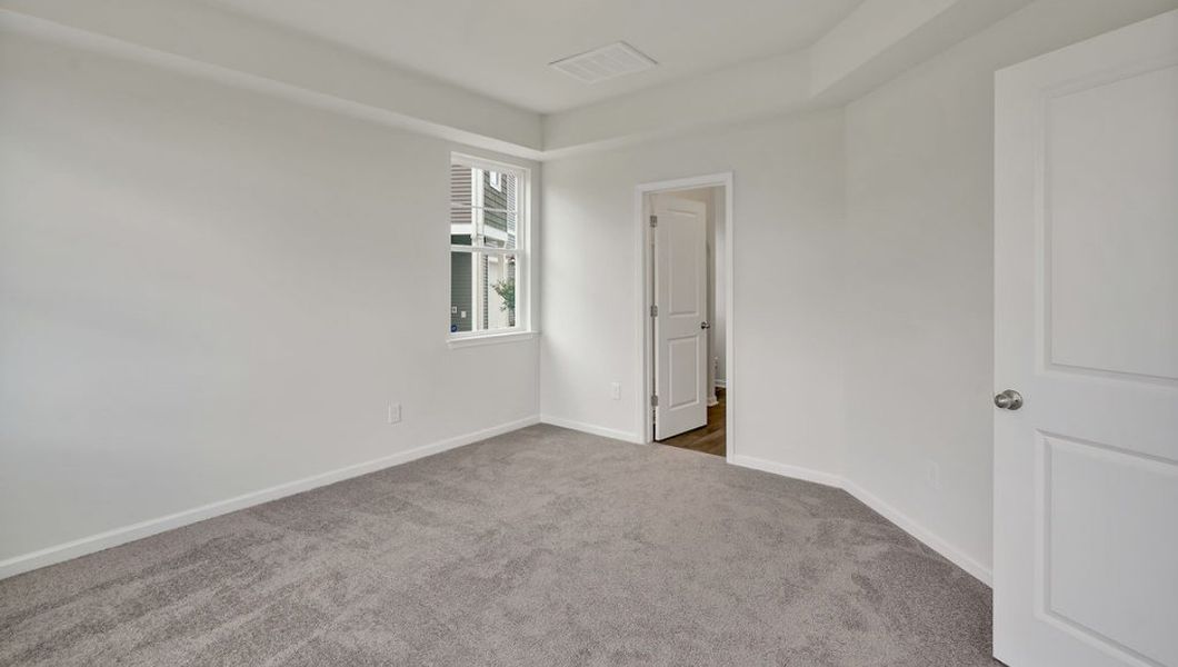 Spacious, unfurnished interior of a new home in Indigo Preserve Townhomes, Leland (Image 14).