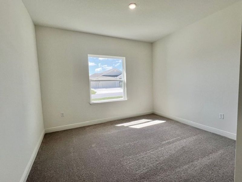 Spacious, unfurnished interior of a new home in Lakes At St Sebastian, Micco (Image 22).