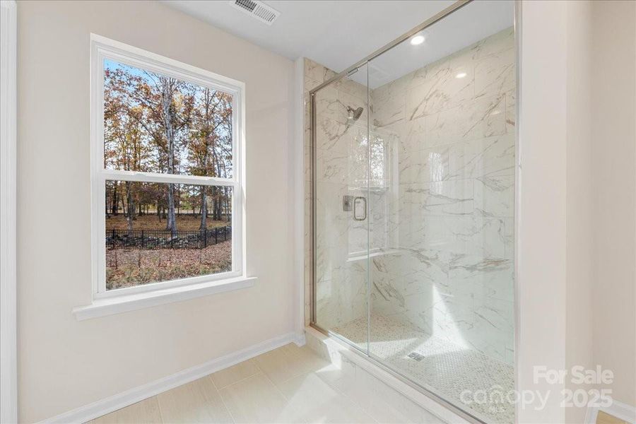 Tile Surround Primary Walk-In Shower.