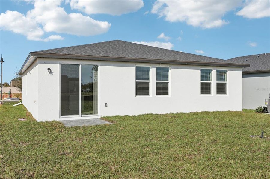 Exterior details and patio area of a home in Crosswinds - Signature Series, Haines City (Image 23).