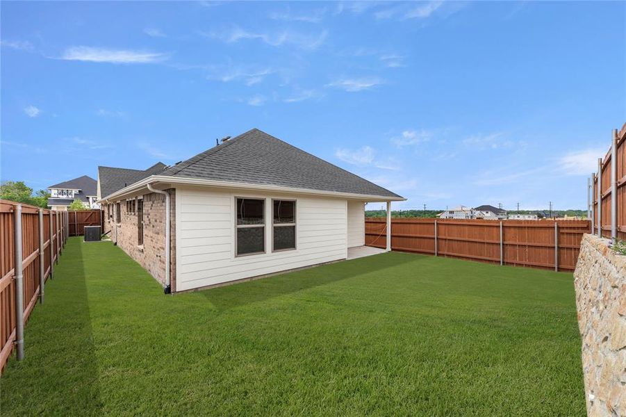 Exterior details and patio area of a home in Heartland, Heartland (Image 3). Exterior details and patio area of a home in Heartland, Heartland (Image 3).