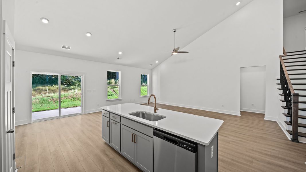 Exceptional culinary space with a striking 8-foot island