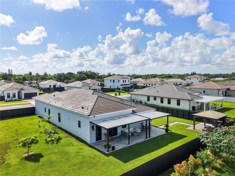 Front exterior of a new home in , Homestead, FL, highlighting curb appeal (Image 22).