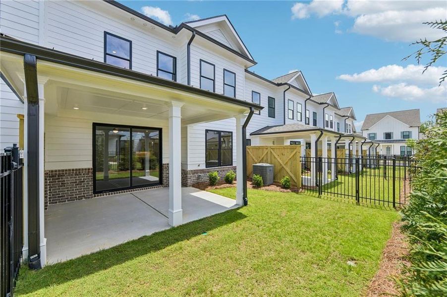 Exterior details and patio area of a home in , Buford (Image 3).