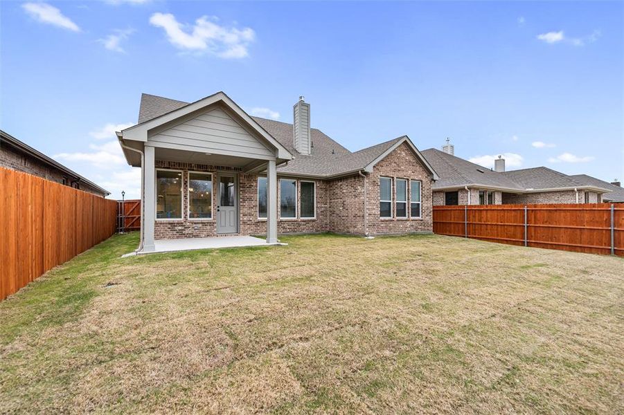 Exterior details and patio area of a home in Morningstar, Aledo (Image 4).