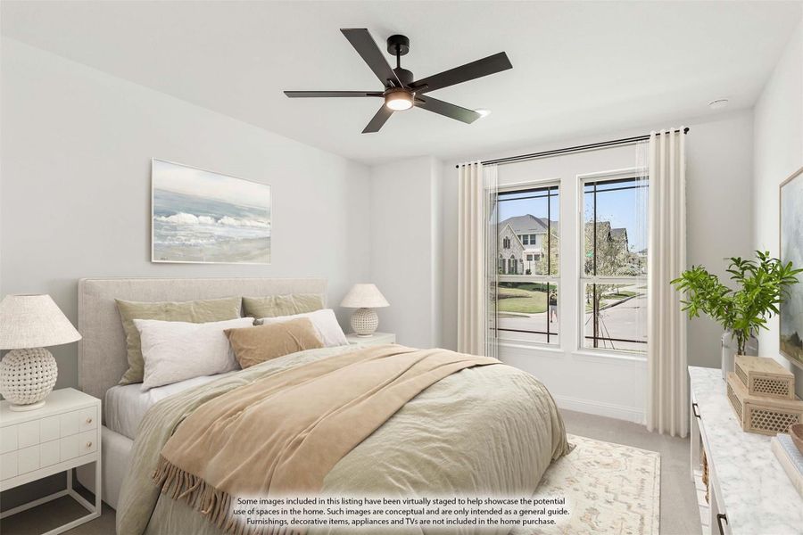 Bedroom with neutral bedding, ceiling fan, and double windows with neighborhood view