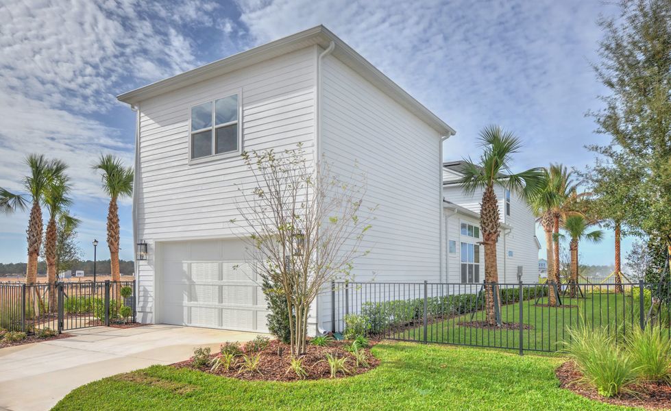 Front exterior of a new home in Seven Pines, Jacksonville, FL, highlighting curb appeal (Image 22).