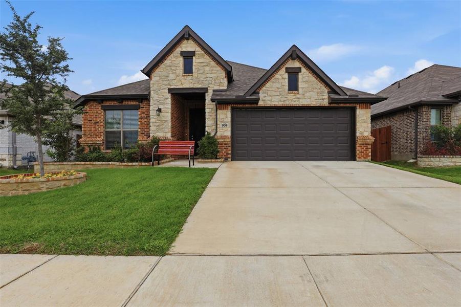 Front exterior of a new home in Chisholm Hills, Cleburne, TX, highlighting curb appeal (Image 23).