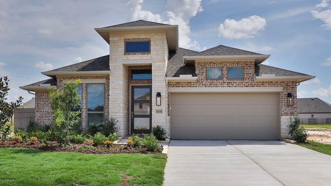 Front exterior of a new home in Artavia, Conroe, TX, highlighting curb appeal (Image 6). Front exterior of a new home in Artavia, Conroe, TX, highlighting curb appeal (Image 6).